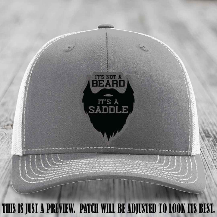 Beard Saddle design on a Grey to Black Patch, Richardson 112 leather patch hat on a Heather Grey to White Hat