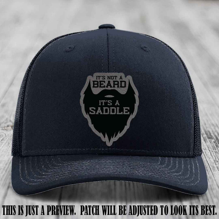 Beard Saddle design on a Grey to Black Patch, Richardson 112 leather patch hat on a Navy Hat