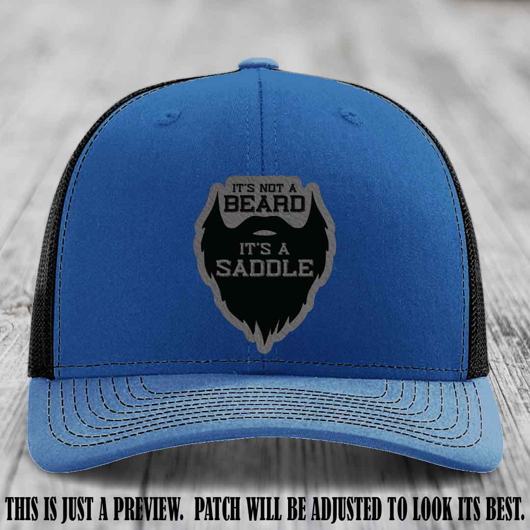 Beard Saddle design on a Grey to Black Patch, Richardson 112 leather patch hat on a Royal to Black Hat