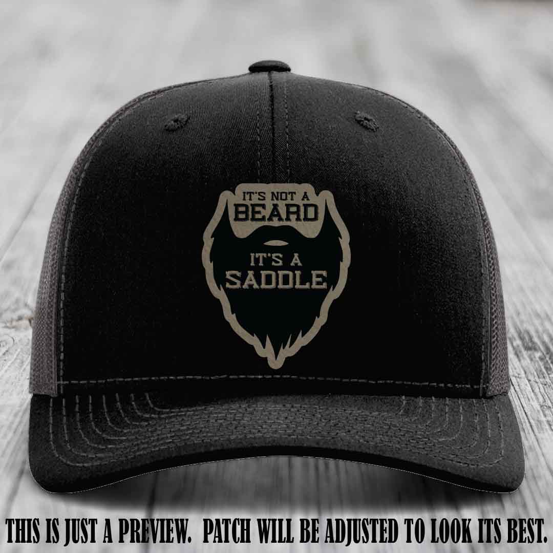 Beard Saddle design on a Light Brown to Black Patch, Richardson 112 leather patch hat on a Black to Charcoal Hat
