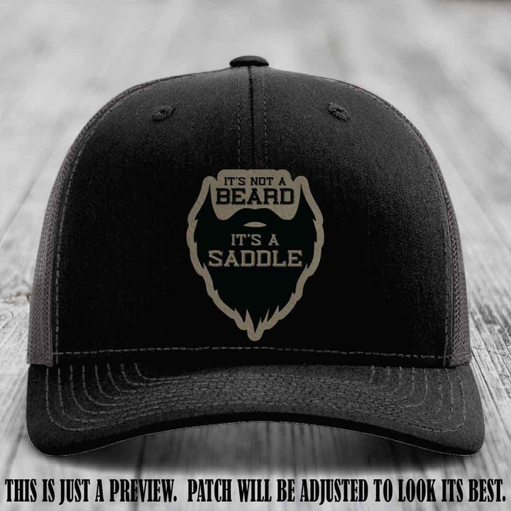 Beard Saddle design on a Light Brown to Black Patch, Richardson 112 leather patch hat on a Black to Charcoal Hat