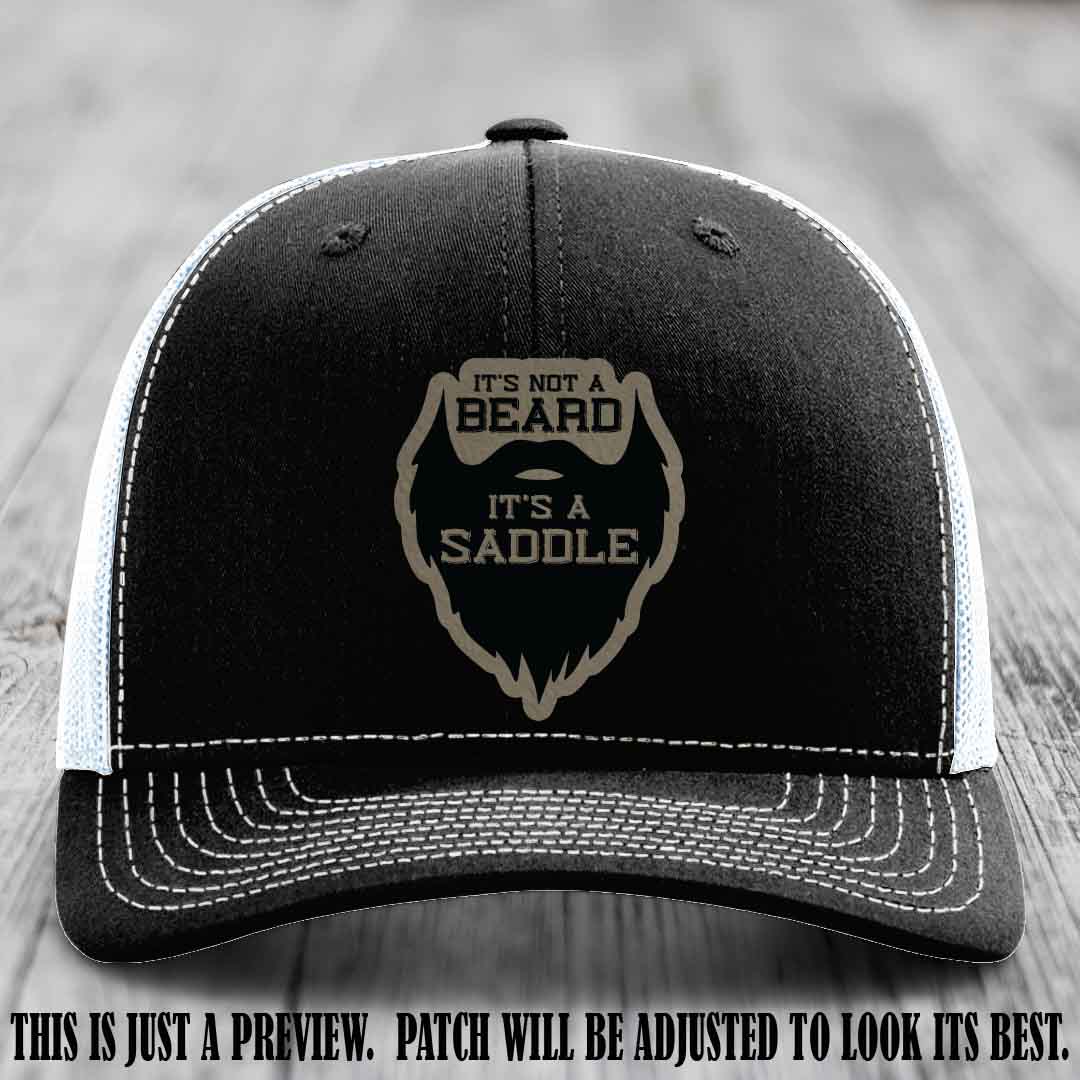 Beard Saddle design on a Light Brown to Black Patch, Richardson 112 leather patch hat on a Black to White Hat