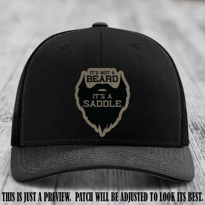 Beard Saddle design on a Light Brown to Black Patch, Richardson 112 leather patch hat on a Black Hat