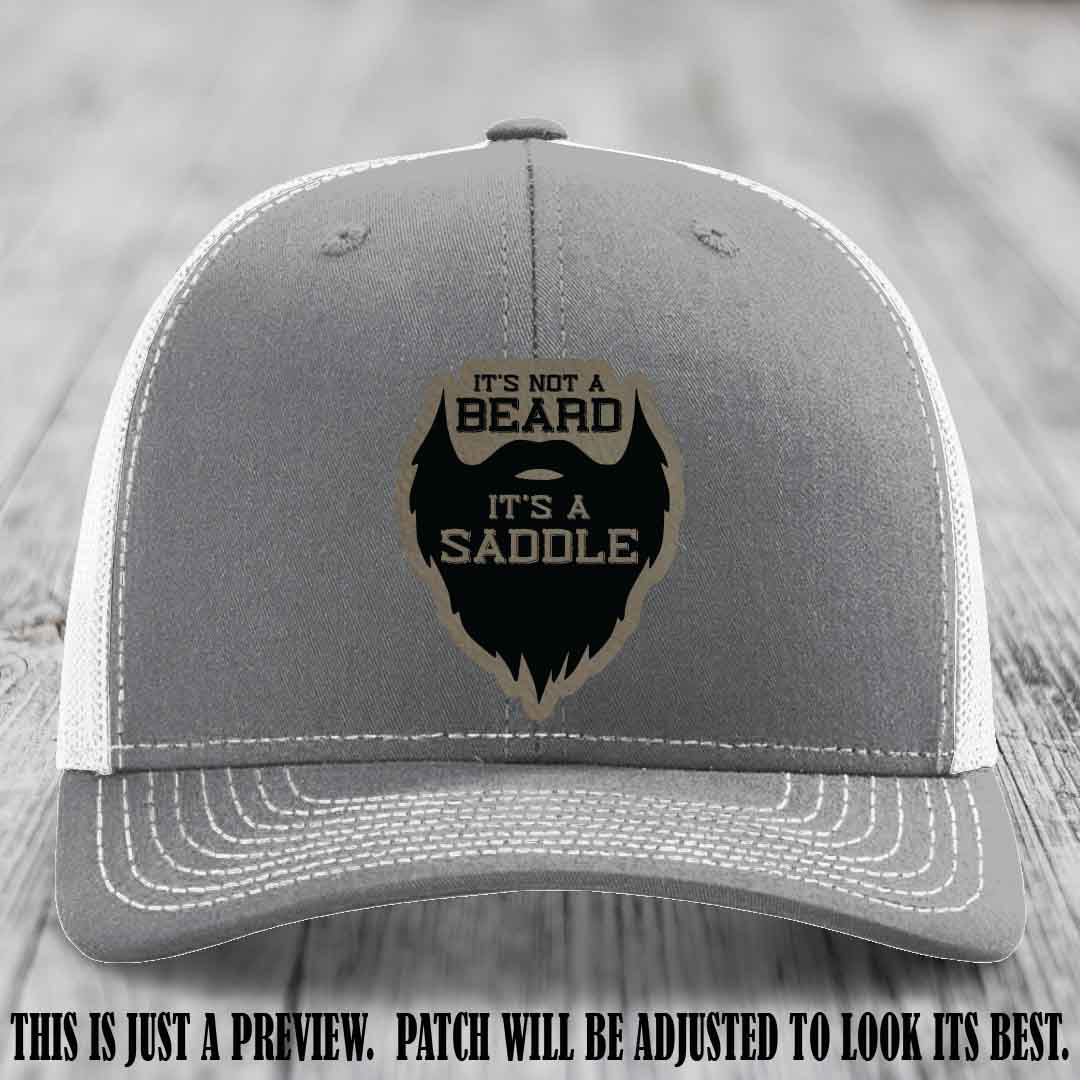 Beard Saddle design on a Light Brown to Black Patch, Richardson 112 leather patch hat on a Heather Grey to White Hat