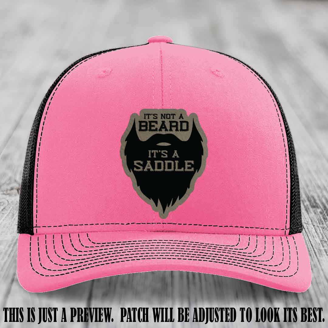 Beard Saddle design on a Light Brown to Black Patch, Richardson 112 leather patch hat on a Hot Pink to Black Hat