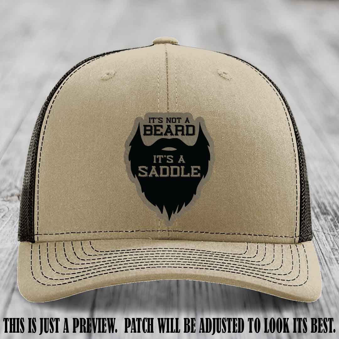 Beard Saddle design on a Light Brown to Black Patch, Richardson 112 leather patch hat on a Khaki to Coffee Hat