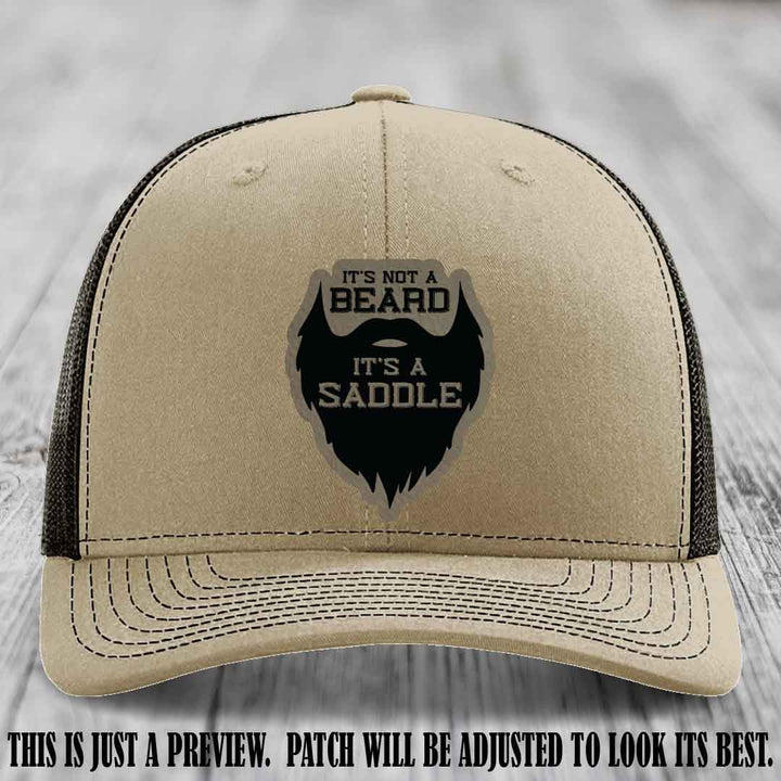 Beard Saddle design on a Light Brown to Black Patch, Richardson 112 leather patch hat on a Khaki to Coffee Hat