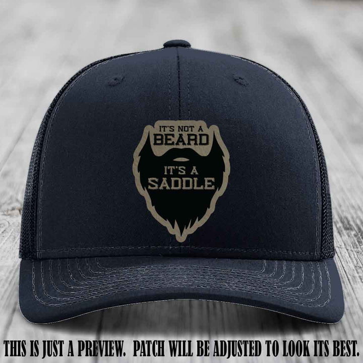 Beard Saddle design on a Light Brown to Black Patch, Richardson 112 leather patch hat on a Navy Hat