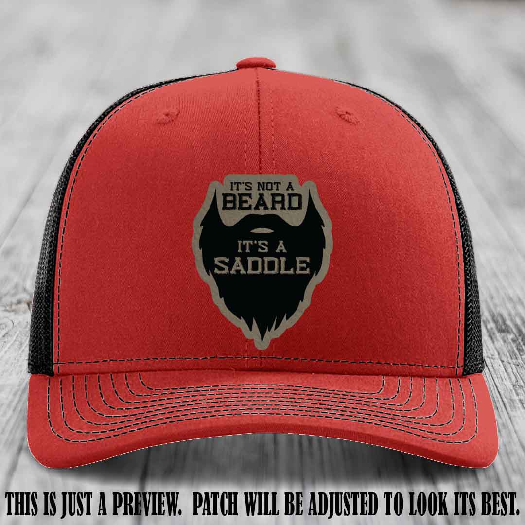 Beard Saddle design on a Light Brown to Black Patch, Richardson 112 leather patch hat on a Red to Black Hat