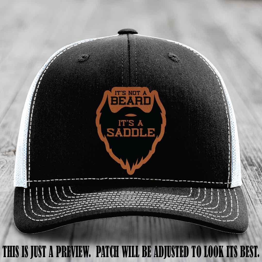 Beard Saddle design on a Rawhide to Black Patch, Richardson 112 leather patch hat on a Black to White Hat
