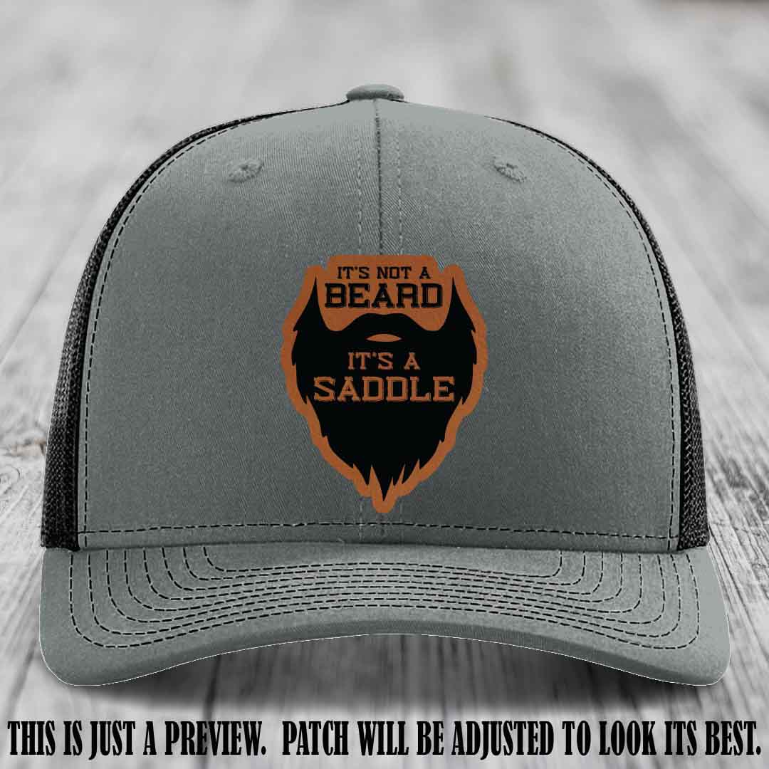 Beard Saddle design on a Rawhide to Black Patch, Richardson 112 leather patch hat on a Heather Grey to Black Hat