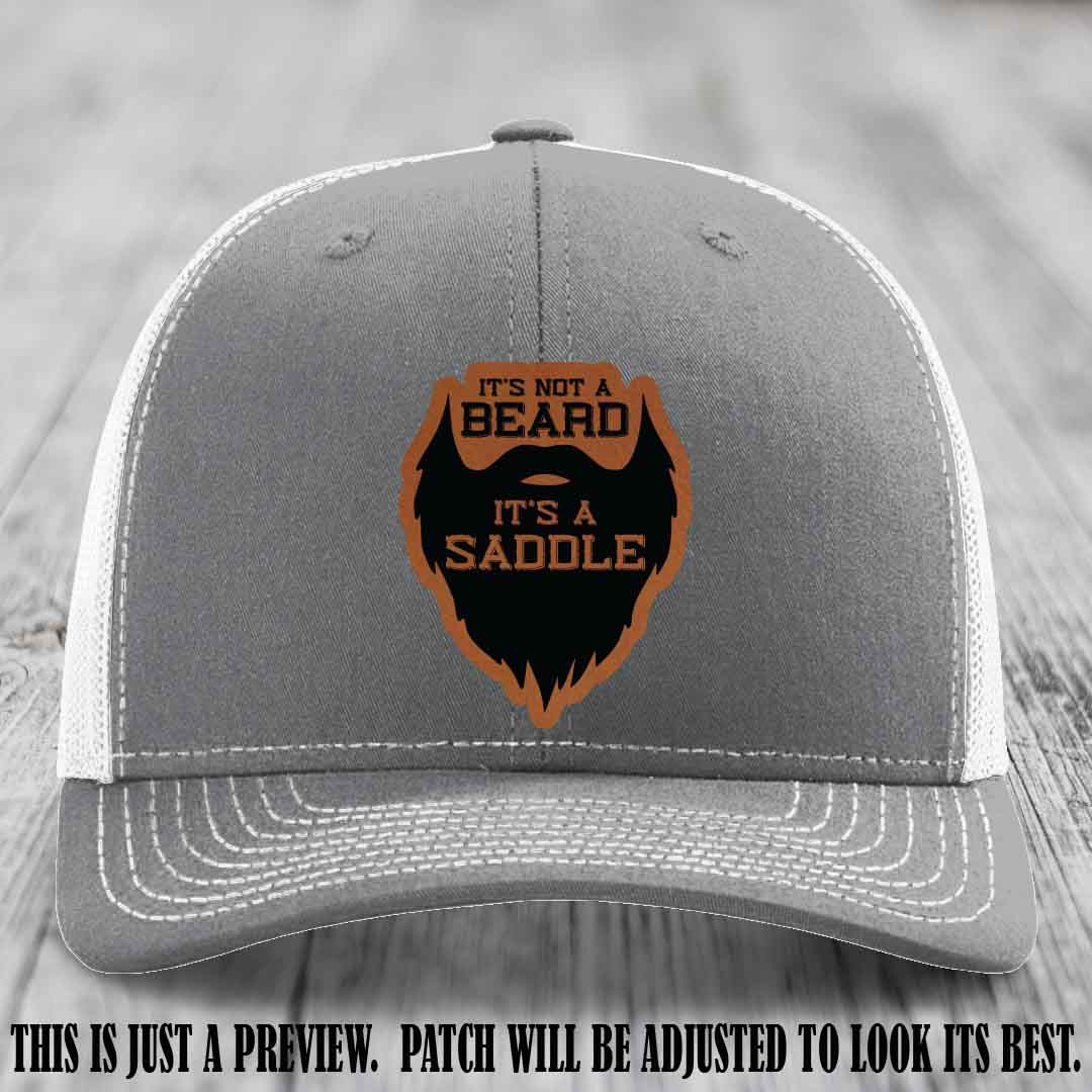 Beard Saddle design on a Rawhide to Black Patch, Richardson 112 leather patch hat on a Heather Grey to White Hat