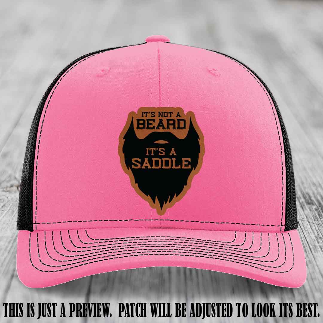Beard Saddle design on a Rawhide to Black Patch, Richardson 112 leather patch hat on a Hot Pink to Black Hat