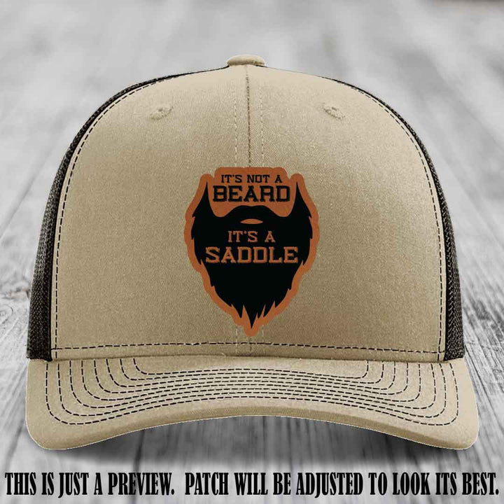 Beard Saddle design on a Rawhide to Black Patch, Richardson 112 leather patch hat on a Khaki to Coffee Hat