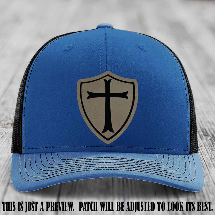Holy Shield design on a Light Brown to Black Patch Richardson 112 hat (Royal to Black Hat)