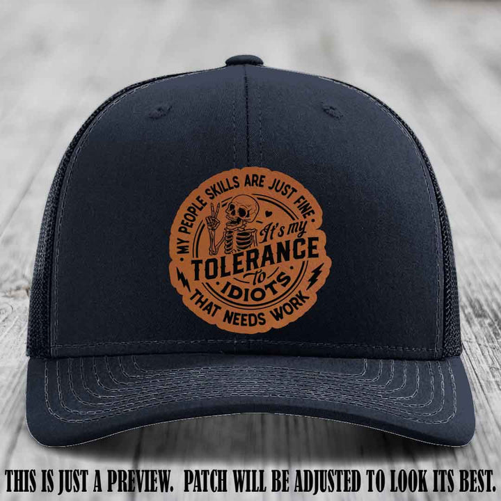 Tolerance to Idiots Rawhide to Black Patch on Navy Hat Richardson 112 leather patch hat