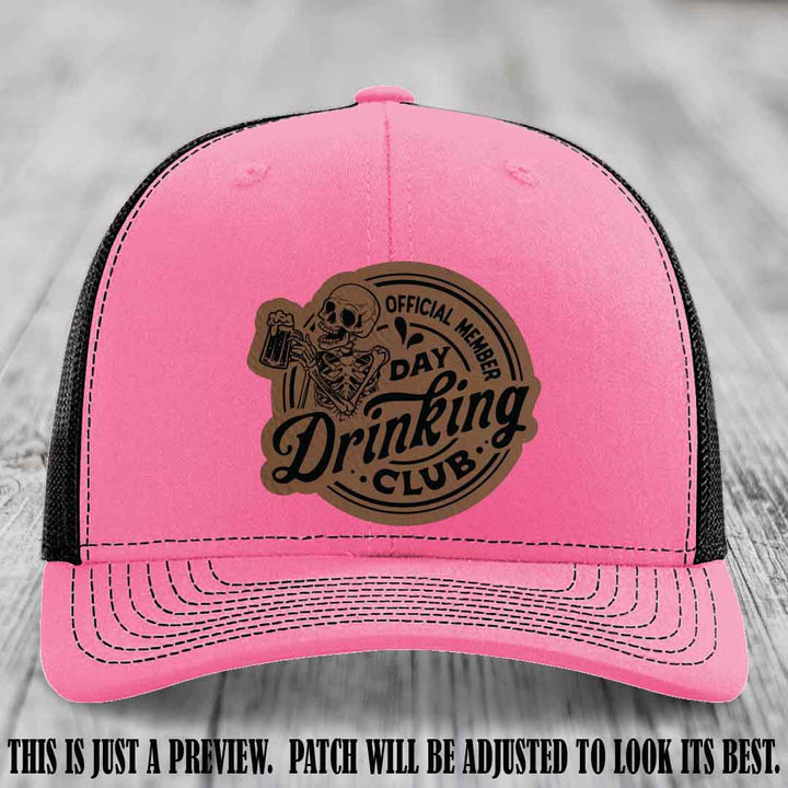 Day Drinking Club dark brown to black patch on hot pink to black hat Richardson 112 custom trucker hat