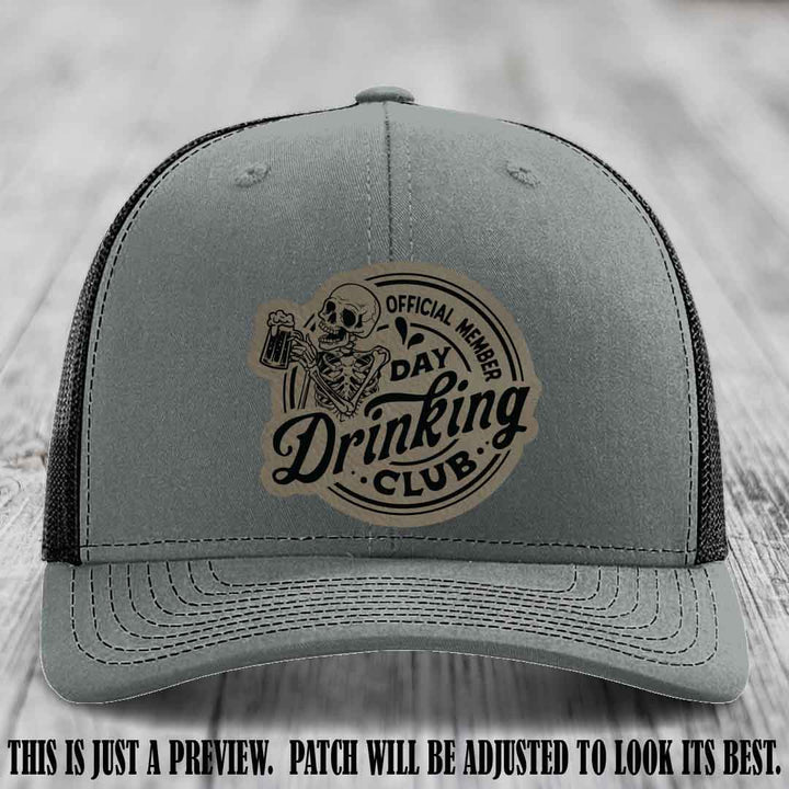Day Drinking Club light brown to black patch on heather grey to black hat Richardson 112 custom trucker hat