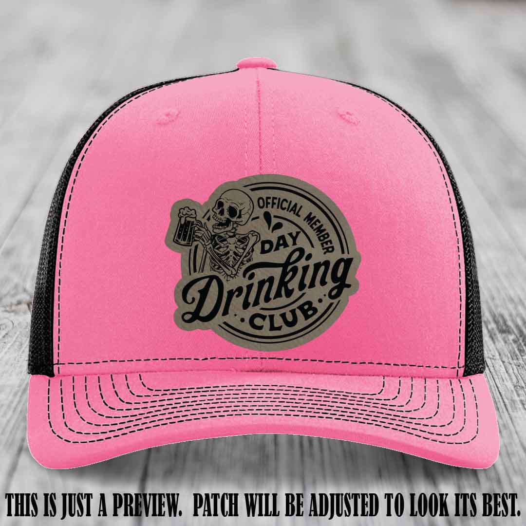Day Drinking Club light brown to black patch on hot pink to black hat Richardson 112 custom trucker hat