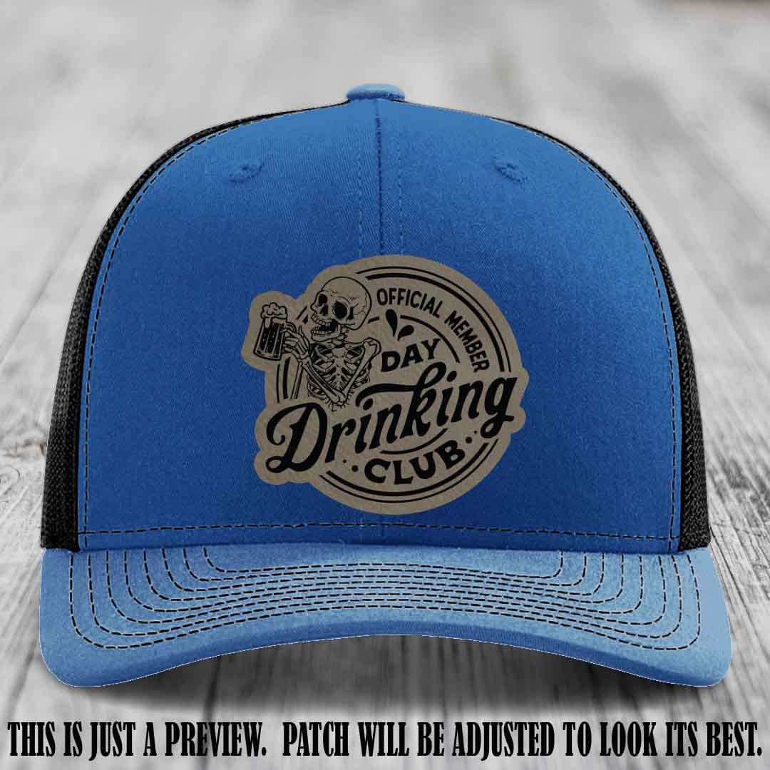 Day Drinking Club light brown to black patch on royal to black hat Richardson 112 custom trucker hat