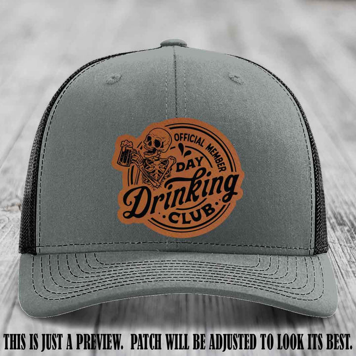 Day Drinking Club rawhide to black patch on heather grey to black hat Richardson 112 custom trucker hat