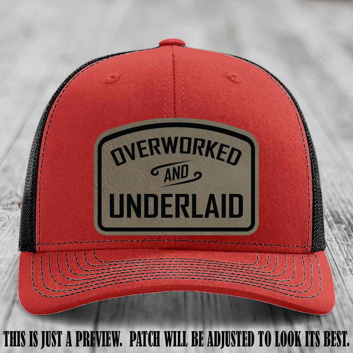 Overworked and Underlaid design Light Brown to Black Patch on Red to Black Hat Richardson 112 Hat