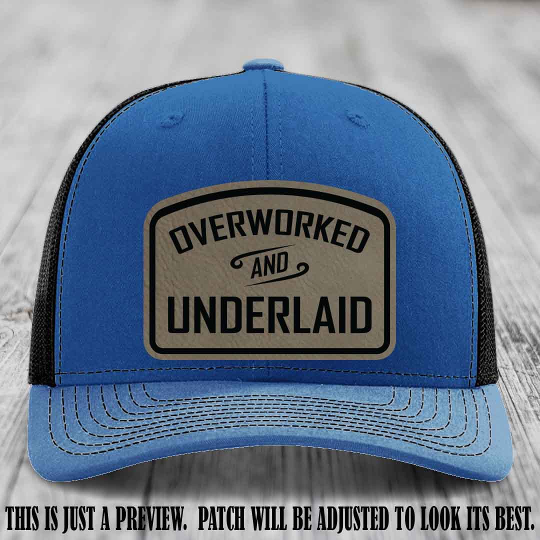 Overworked and Underlaid design Light Brown to Black Patch on Royal to Black Hat Richardson 112 Hat