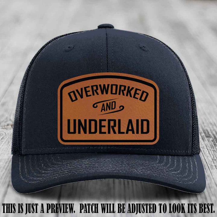 Overworked and Underlaid design Rawhide to Black Patch on Navy Hat Richardson 112 Hat