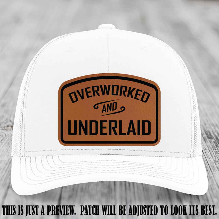 Overworked and Underlaid design Rawhide to Black Patch on White Hat Richardson 112 Hat