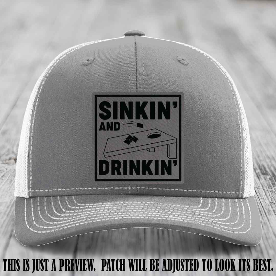 Sinkin' and Drinkin' design on Grey to Black Patch, Richardson 112 Heather Grey to White Hat