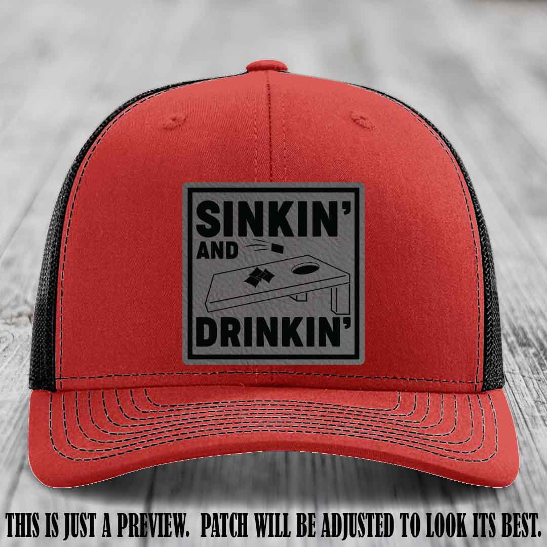 Sinkin' and Drinkin' design on Grey to Black Patch, Richardson 112 Red to Black Hat