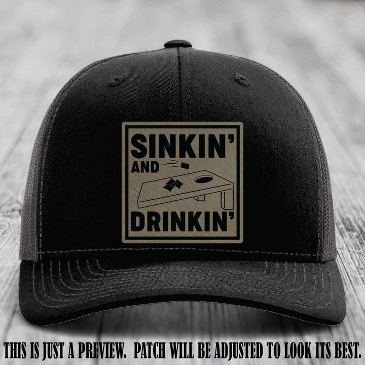 Sinkin' and Drinkin' design on Light Brown to Black Patch, Richardson 112 Black to Charcoal Hat