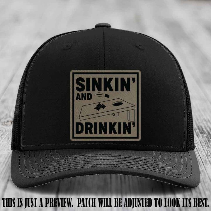 Sinkin' and Drinkin' design on Light Brown to Black Patch, Richardson 112 Black Hat
