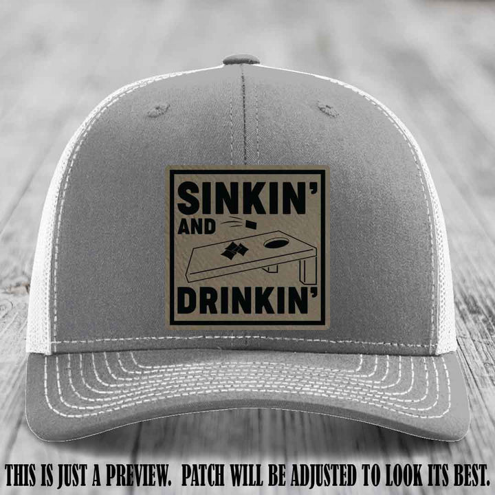 Sinkin' and Drinkin' design on Light Brown to Black Patch, Richardson 112 Heather Grey to White Hat
