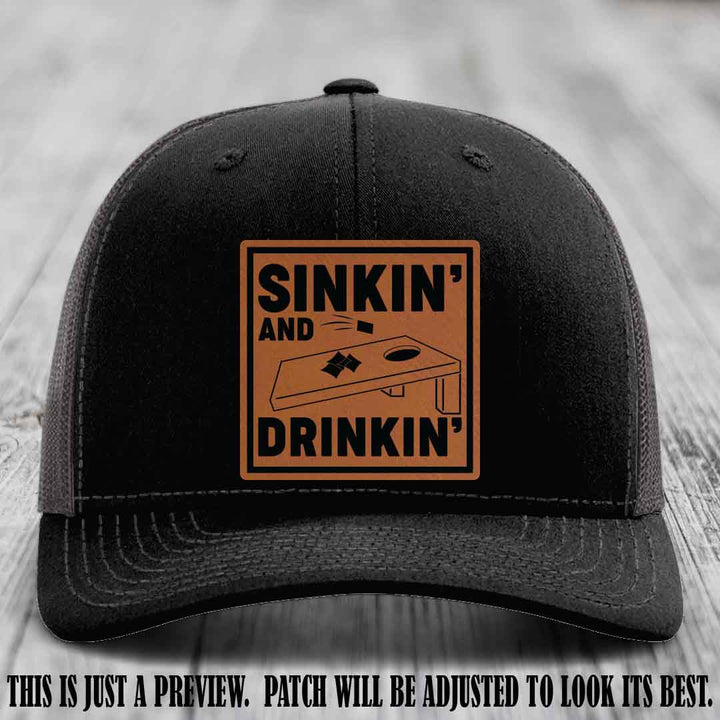 Sinkin' and Drinkin' design on Rawhide to Black Patch, Richardson 112 Black to Charcoal Hat
