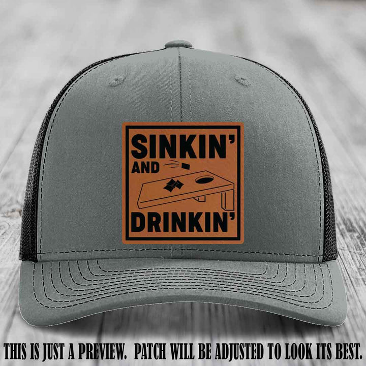 Sinkin' and Drinkin' design on Rawhide to Black Patch, Richardson 112 Heather Grey to Black Hat