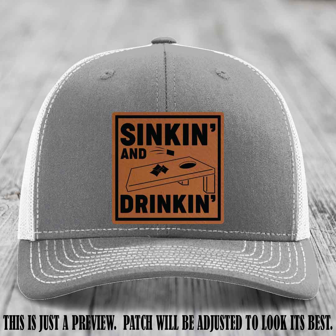 Sinkin' and Drinkin' design on Rawhide to Black Patch, Richardson 112 Heather Grey to White Hat