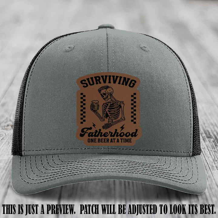 Surviving Fatherhood - Dark Brown to Black Patch on Heather Grey to Black Hat, funny dad hat