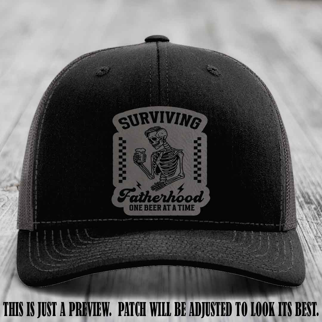 Surviving Fatherhood - Grey to Black Patch on Black to Charcoal Hat, funny dad hat