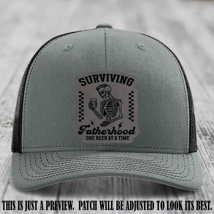 Surviving Fatherhood - Grey to Black Patch on Heather Grey to Black Hat, funny dad hat