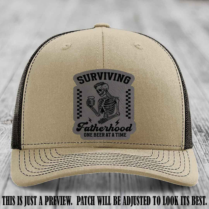 Surviving Fatherhood - Grey to Black Patch on Khaki to Coffee Hat, funny dad hat
