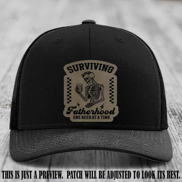 Surviving Fatherhood - Light Brown to Black Patch on Black Hat, funny dad hat