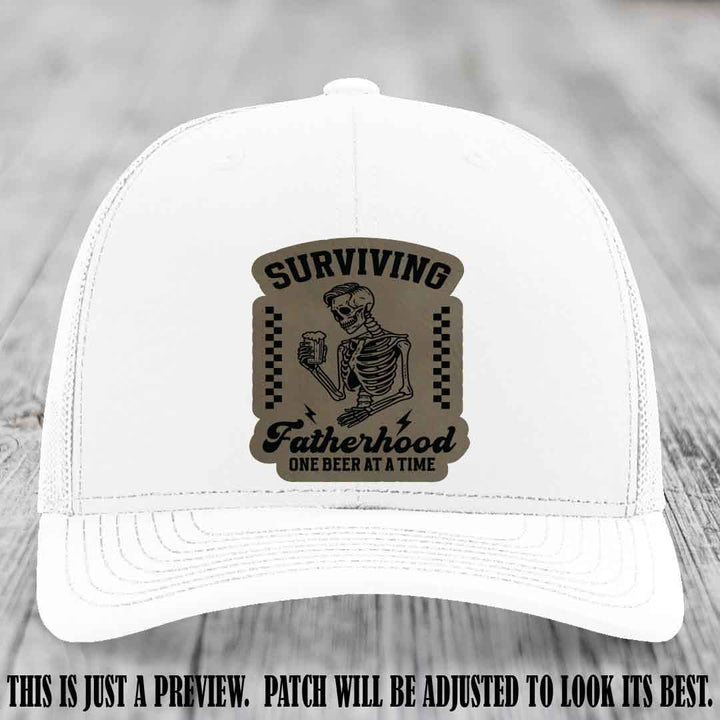 Surviving Fatherhood - Light Brown to Black Patch on White Hat, funny dad hat