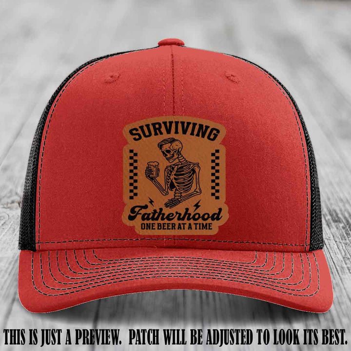 Surviving Fatherhood - Rawhide to Black Patch on Red to Black Hat, funny dad hat