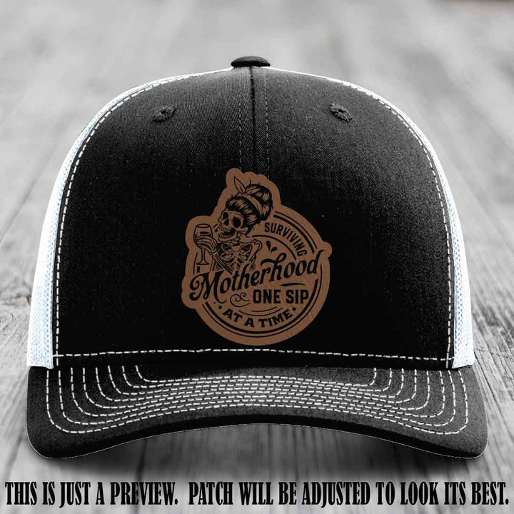 Surviving Motherhood One Sip at a Time Dark Brown to Black Patch on Richardson 112 Hat - Black to White Hat