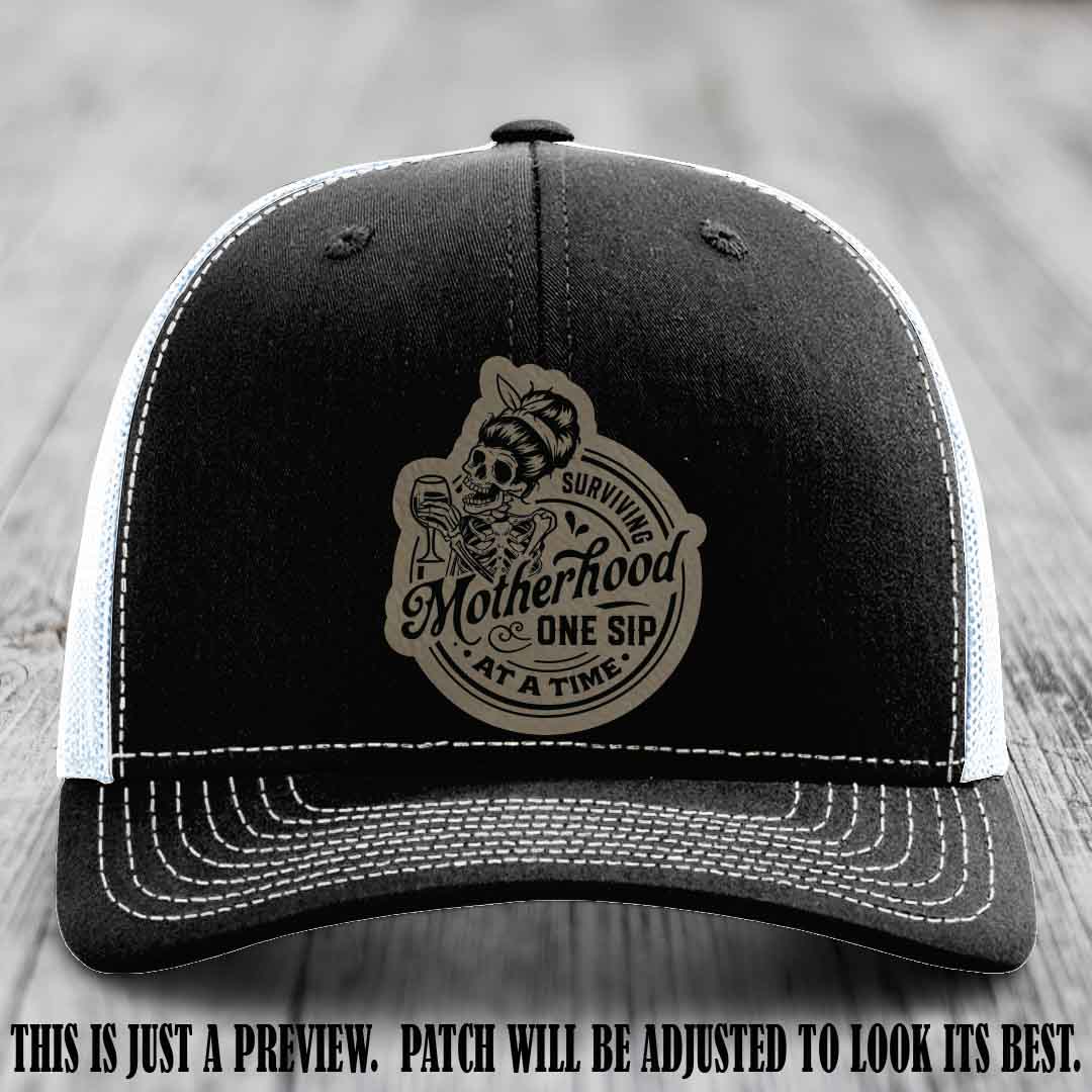 Surviving Motherhood One Sip at a Time Light Brown to Black Patch on Richardson 112 Hat - Black to White Hat