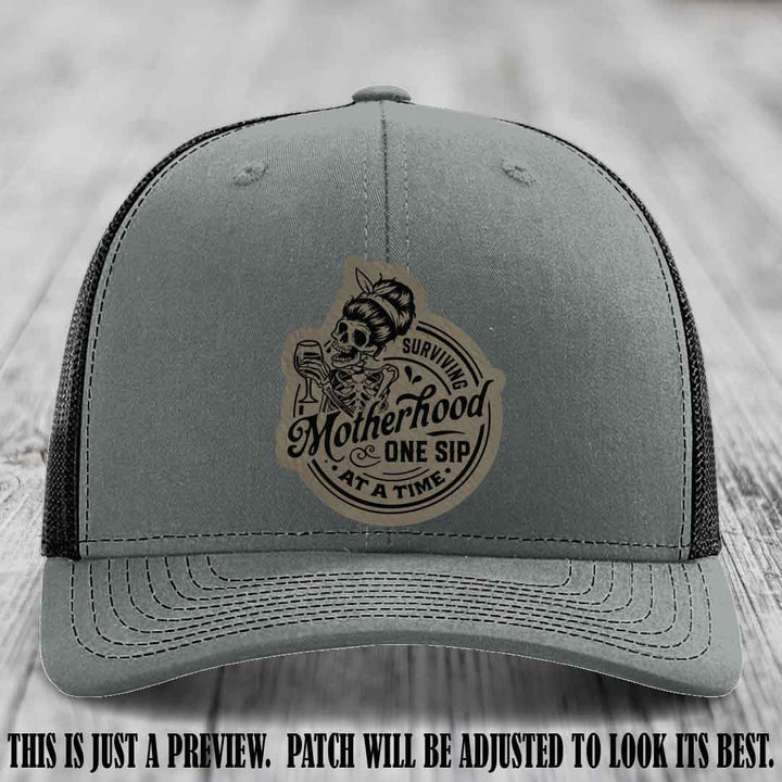 Surviving Motherhood One Sip at a Time Light Brown to Black Patch on Richardson 112 Hat - Heather Grey to Black Hat