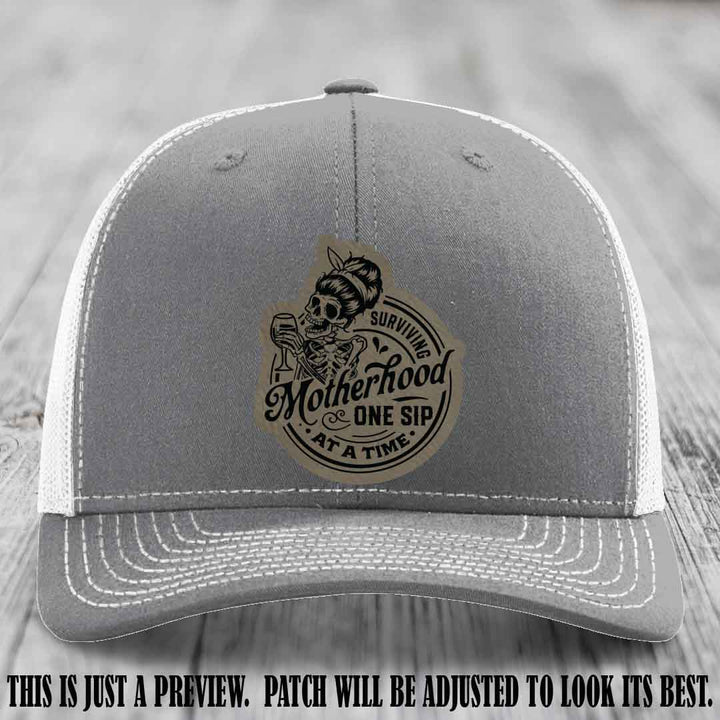 Surviving Motherhood One Sip at a Time Light Brown to Black Patch on Richardson 112 Hat - Heather Grey to White Hat