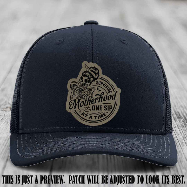 Surviving Motherhood One Sip at a Time Light Brown to Black Patch on Richardson 112 Hat - Navy Hat