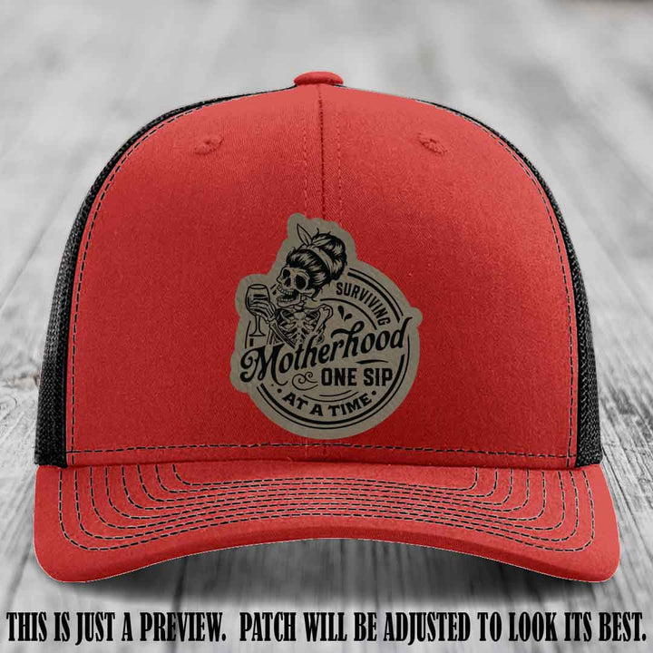 Surviving Motherhood One Sip at a Time Light Brown to Black Patch on Richardson 112 Hat - Red to Black Hat